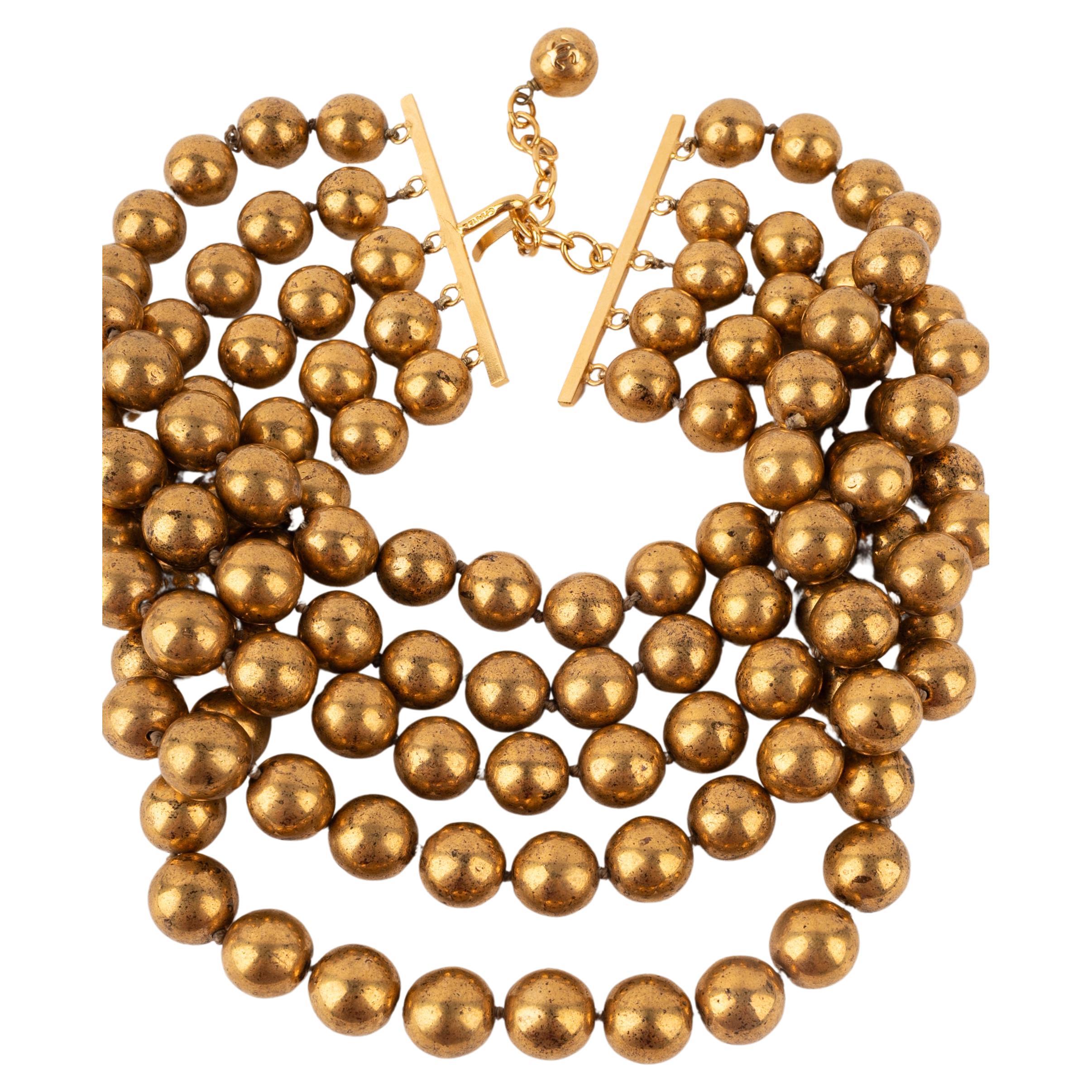 Chanel golden pearl necklace For Sale