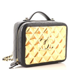 Chanel Vanity Case Golden Plate en métal matelassé et cuir d'agneau Moyen