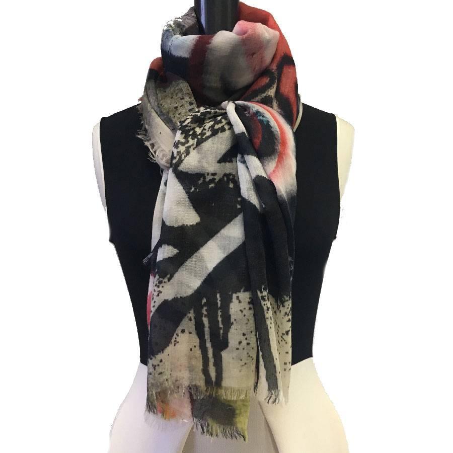 Superb Chanel  graffiti shawl with small fringes multicolored cashmere. Patterns: CC, camellia and writings.

New condition.

Dimensions: 132x192 cm

Will be delivered in a new, non-original dust bag