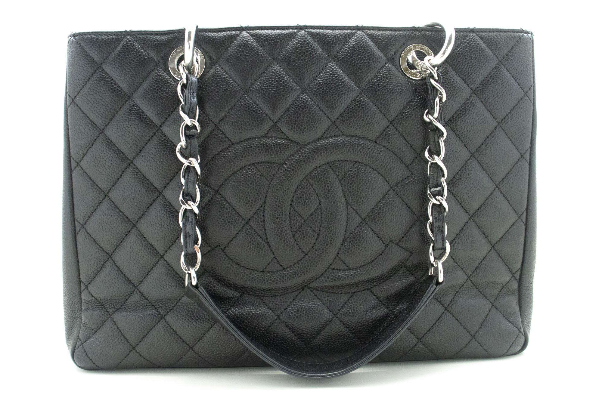 An authentic CHANEL Grained Calfskin GST 13