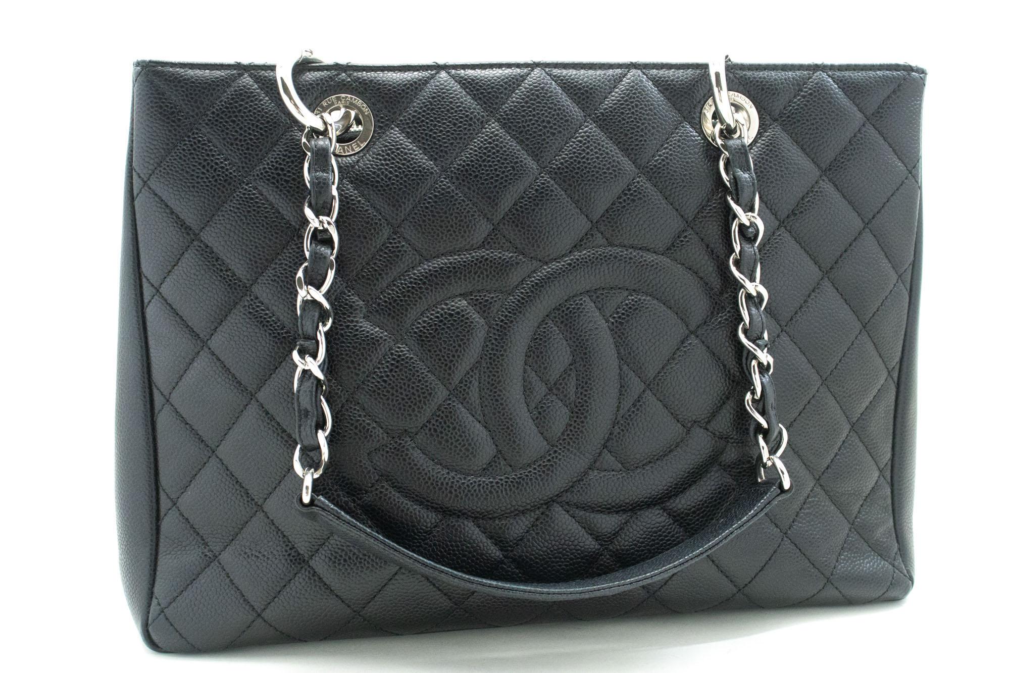 An authentic CHANEL Grained Calfskin GST 13