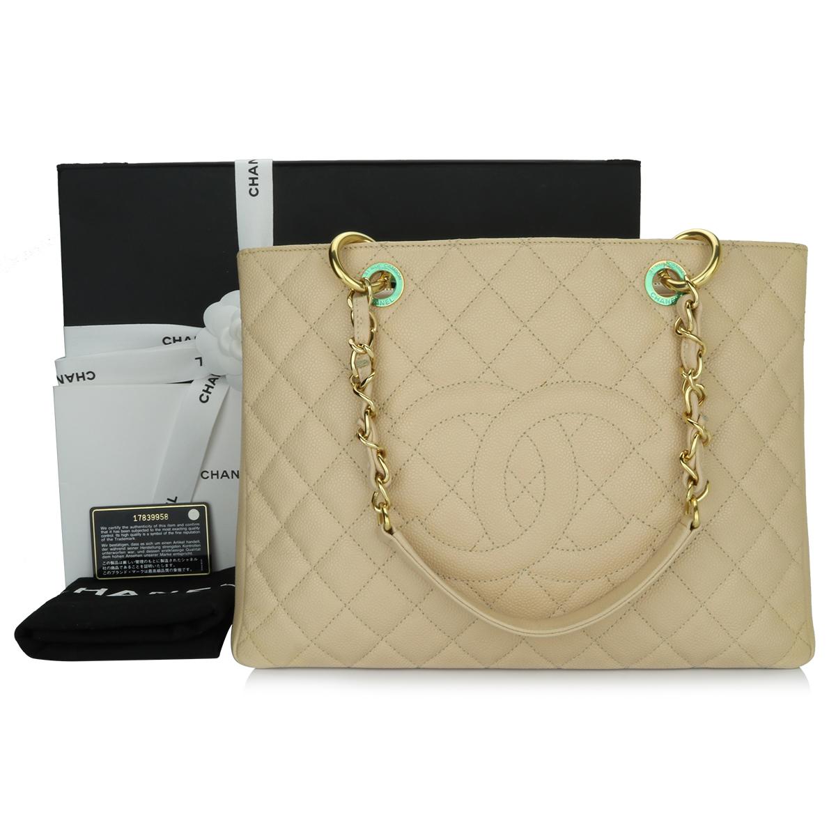 Authentic CHANEL Grand Shopping Tote (GST) Beige Clair Caviar with Gold Hardware 2013.

This bag is in excellent condition, the bag still holds its shape really well, and the hardware is still shiny.

Exterior Condition: Excellent condition, corners