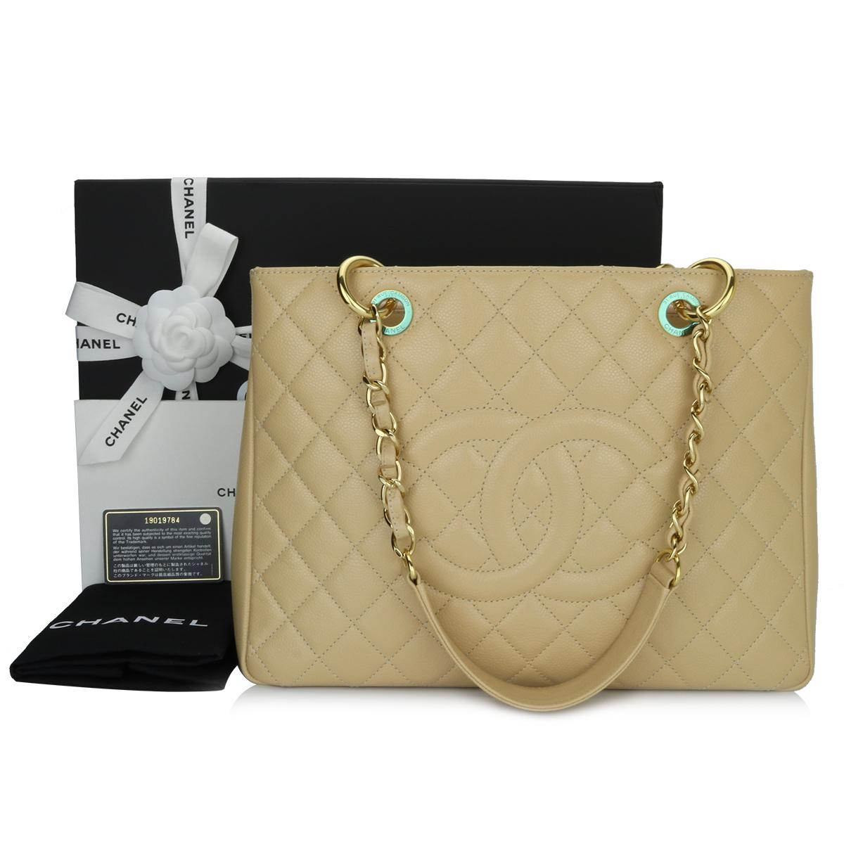 Authentic CHANEL Grand Shopping Tote (GST) Beige Clair Caviar with Gold Hardware 2014.

This stunning bag is still in mint condition; it still keeps its original shape well and the hardware still very shiny, leather smells fresh as if new.

Exterior