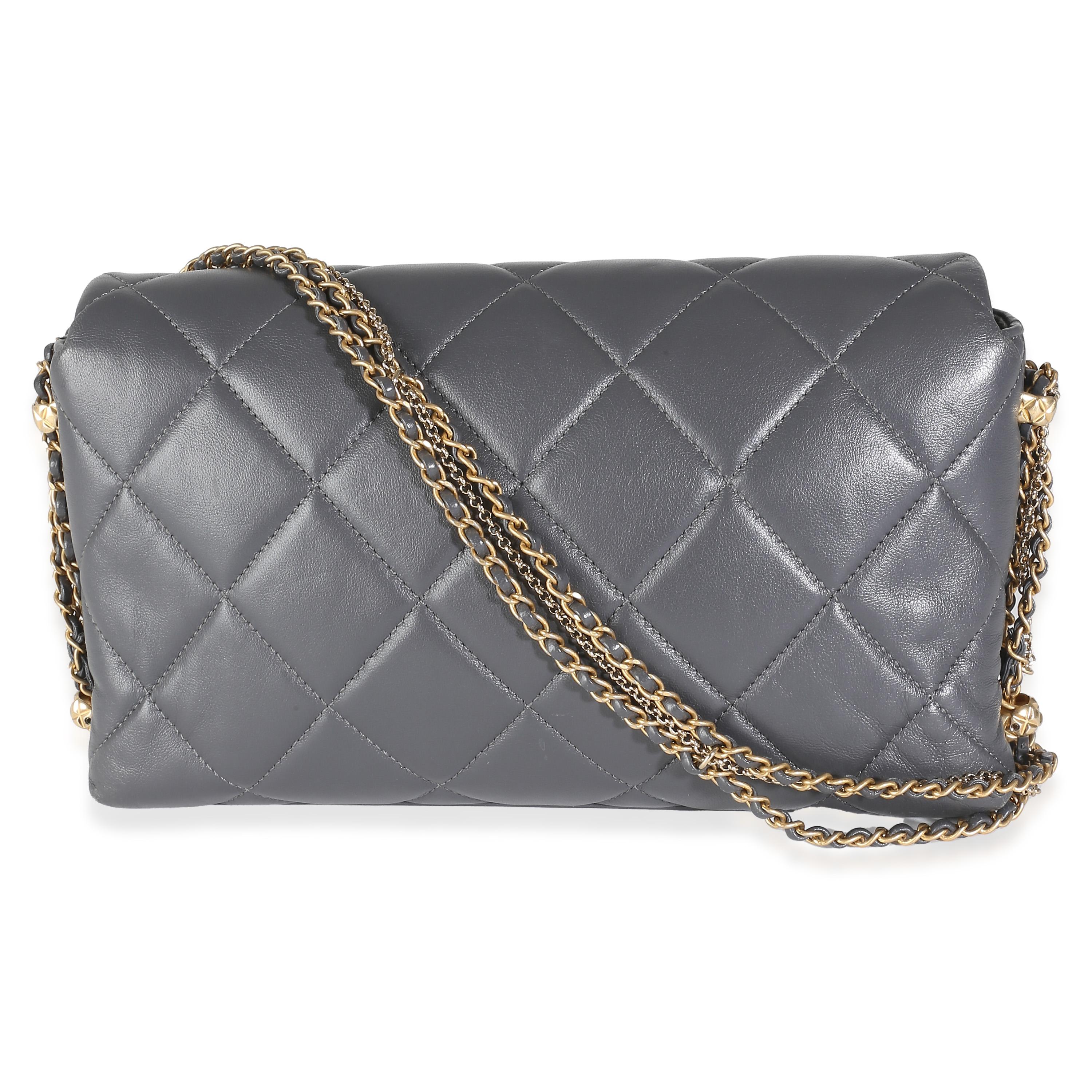 Listing Title: Chanel Gray Quilted Lambskin Crush On Chains Flap Bag
SKU: 142772
Condition: Pre-owned 
Condition Description: A timeless classic that never goes out of style, the flap bag from Chanel dates back to 1955 and has seen a number of