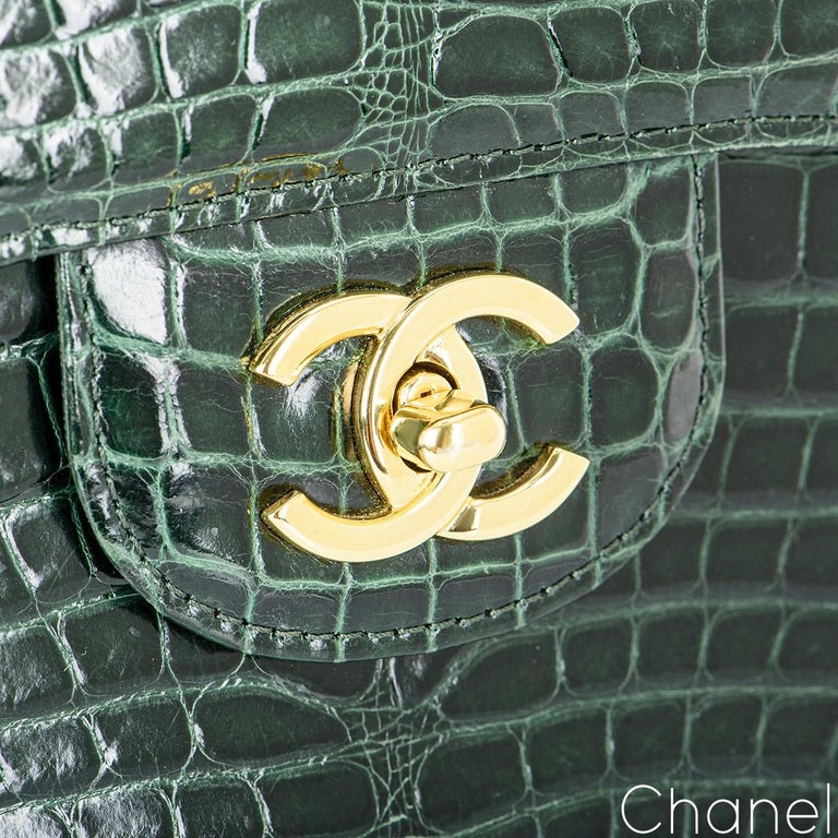 A SHINY GREEN ALLIGATOR MEDIUM DOUBLE FLAP BAG WITH GOLD HARDWARE