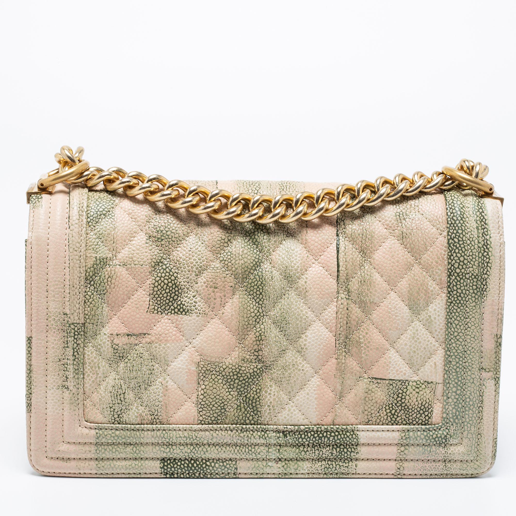 Every Chanel creation deserves to be a part of your closet as they carry irreplaceable style, just like this Boy flap bag that has been exquisitely crafted from quilted leather. The piece has the iconic CC logo, and a lovely chain-link strap just so