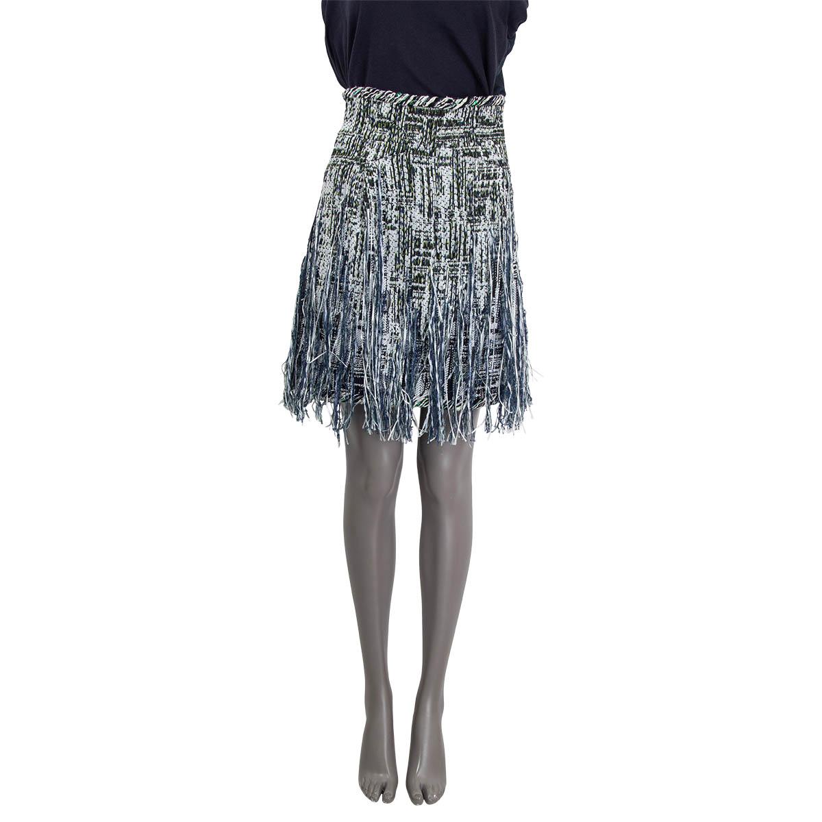 100% authentic Chanel high waisted fringed mini skirt from Spring 2018 in green, blue, white and navy cotton (34%), polyamide (32%), acrylic (24%), viscose (6%), polyester (3%) nd metal polyester (1%). Has silver lurex fringes all over and is