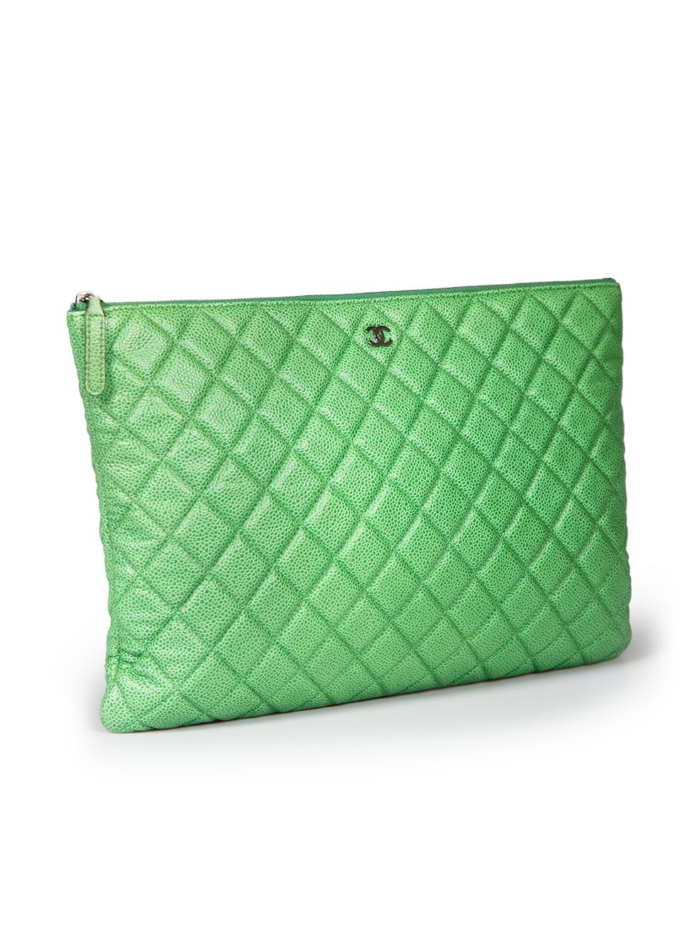 CONDITION is Very good. Minimal wear to clutch is evident. Minimal discolouration to bottom corners. The zipper pull show signs of abrasion on this used Chanel designer resale item.
 
 
 
 Details
 
 
 Model: O-Case
 
 Green
 
 Caviar leather
 
