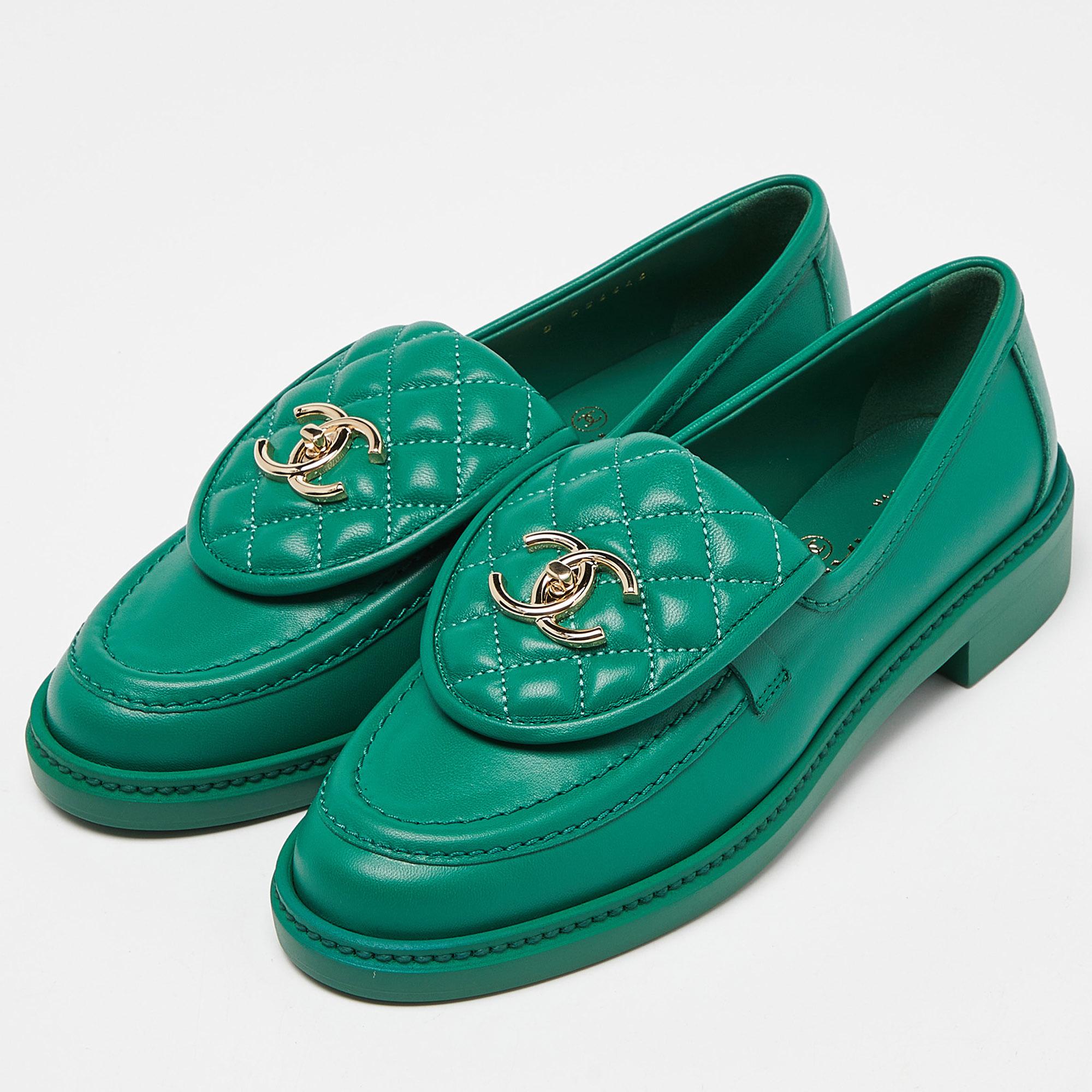 Crafted with meticulous attention to detail, these Chanel loafers boast luxurious green leather adorned with the iconic CC interlocking logo. With their sophisticated design and superior craftsmanship, they effortlessly elevate any ensemble with