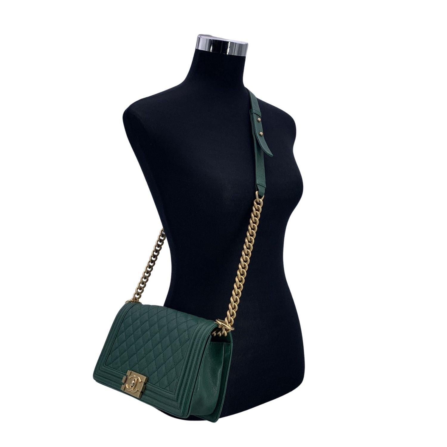 This beautiful Bag will come with a Certificate of Authenticity provided by Entrupy. The certificate will be provided at no further cost. Chanel medium quilted Caviar leather shoulder bag . Period/Era: 2018-2019. Crafted of green quilted leather