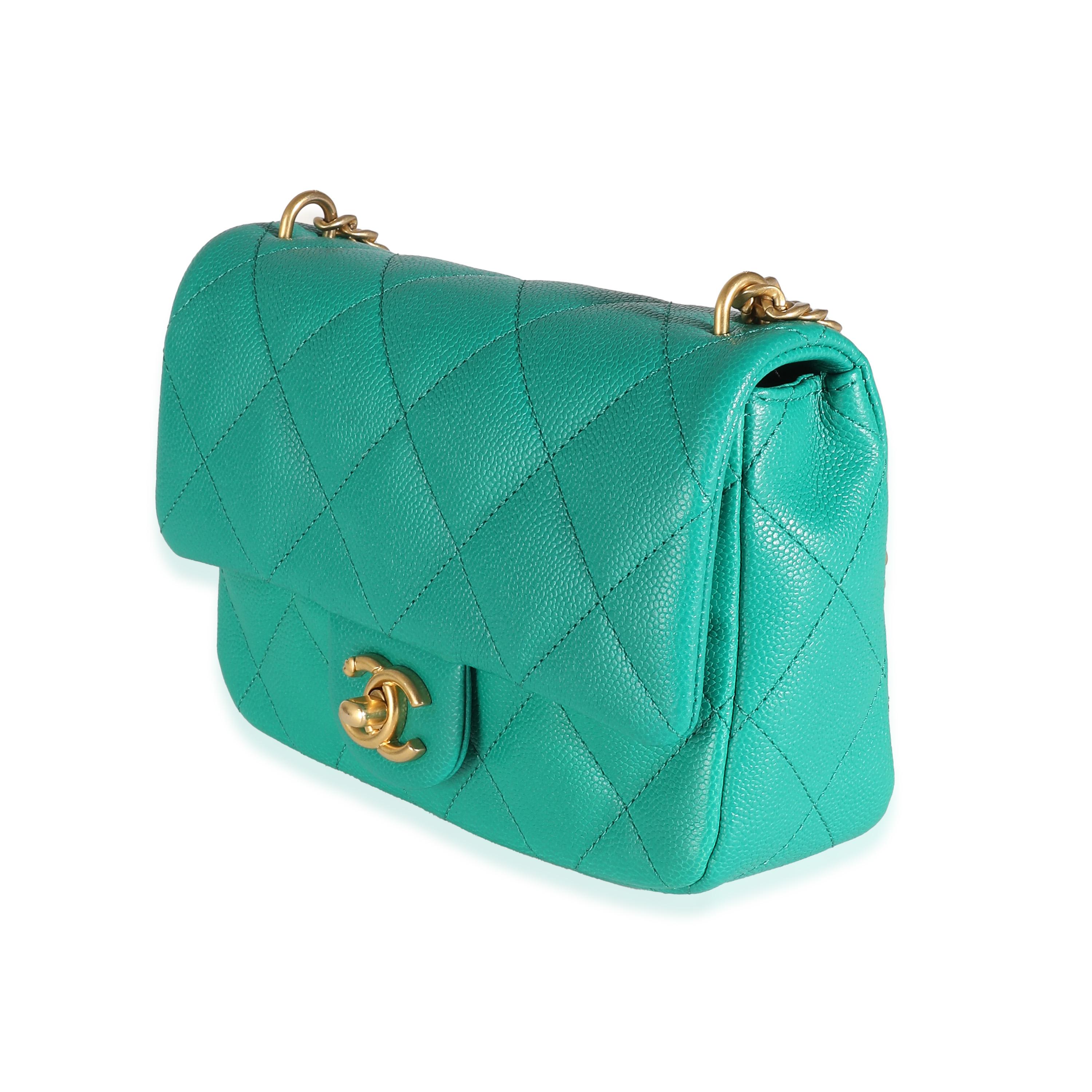 Listing Title: Chanel Green Quilted Caviar Sweetheart Mini Flap Bag
SKU: 138572
Condition: Pre-owned 
Condition Description: A timeless classic that never goes out of style, the flap bag from Chanel dates back to 1955 and has seen a number of