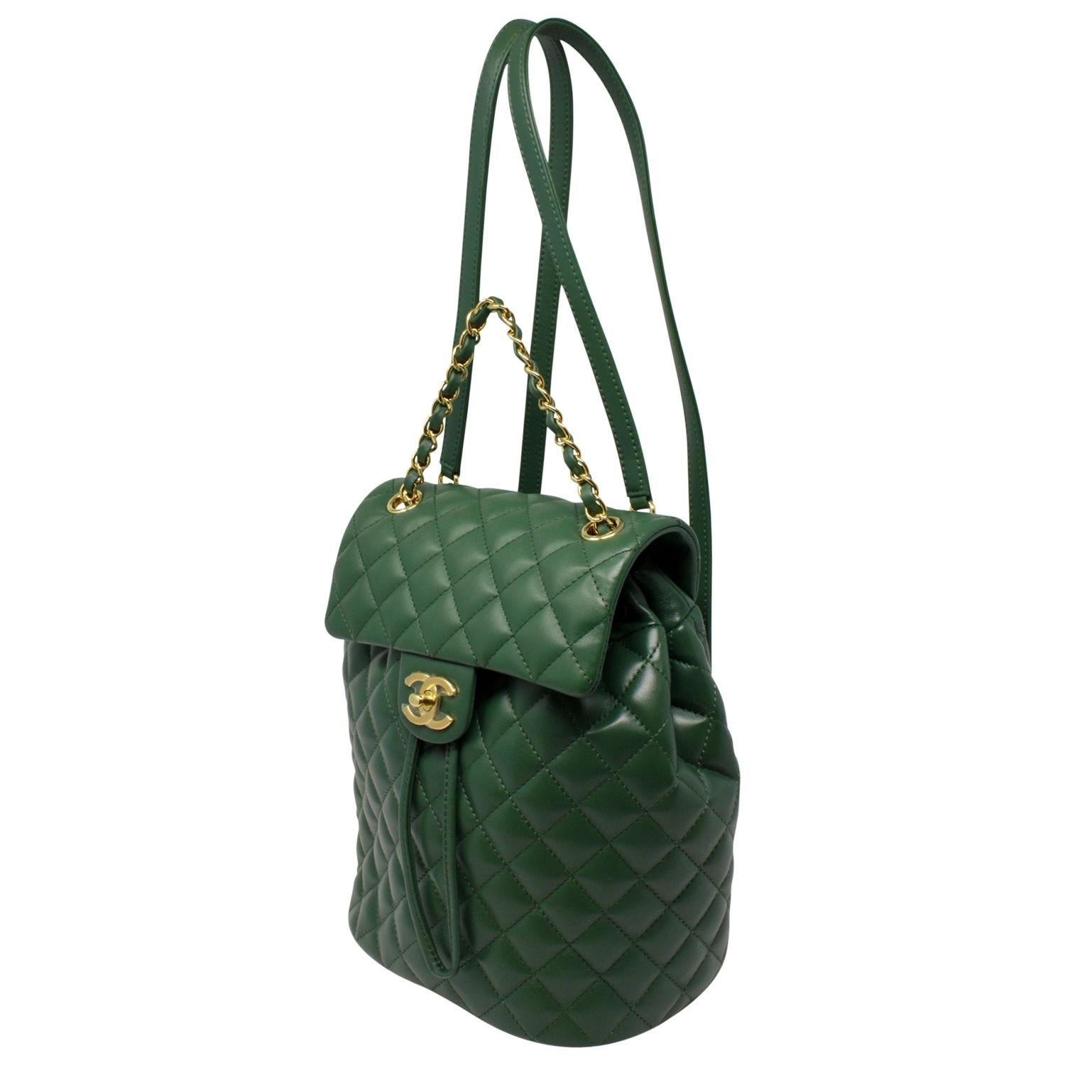 Be the first to carry this gorgeous green quilted lambskin Chanel treasure (protective plastic is STILL ON ALL THE HARDWARE!) She is the most perfect size for a backpack where you can fit your essentials but does not feel like you are going to