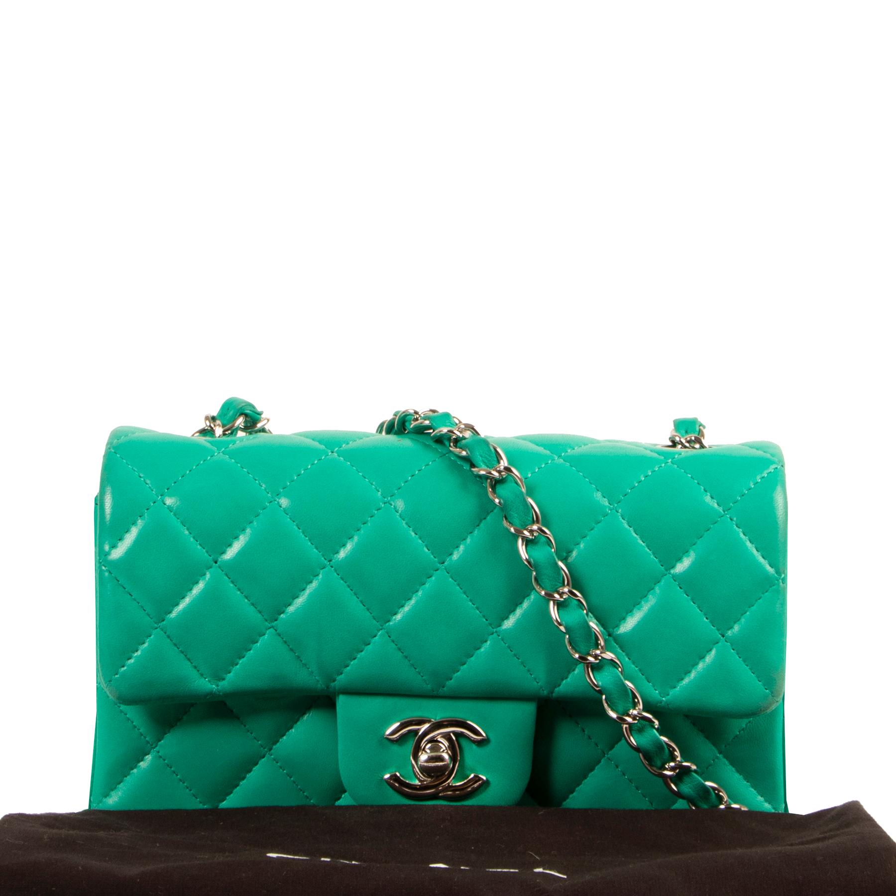 Chanel Green Quilted Lambskin Mini Classic Single Flap Bag

The others will be green with envy when you are carrying this arm candy. Chanel’s Classic Flap bag comes in a combination of buttery green lambskin with shiny silver-tone hardware.

This