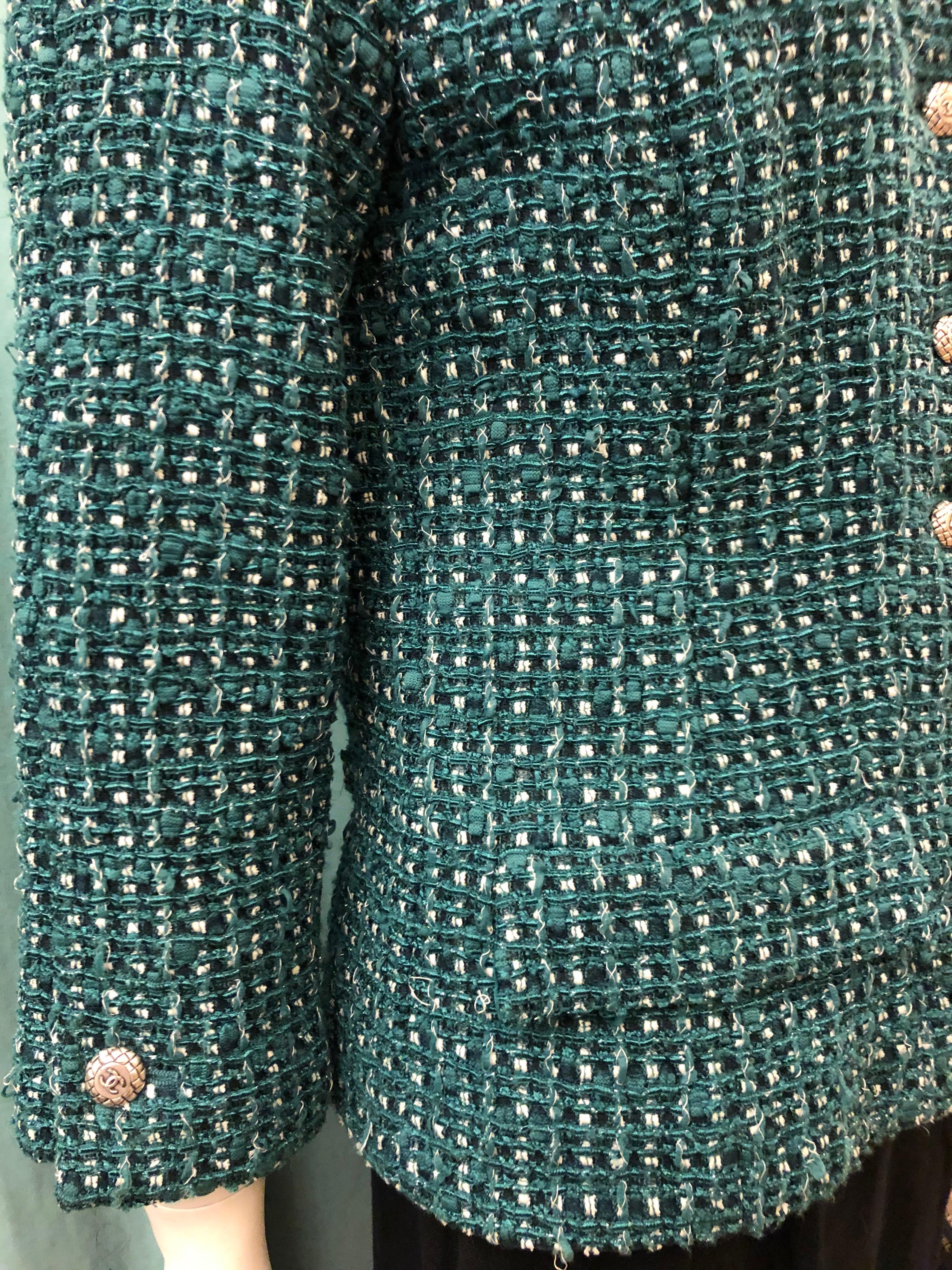 - Chanel green, white , black tweed jacket from 2006 cruise collection. 

- 3/4 length sleeves. 

- Silver buttons hardware closure. 

- Two front pockets. 

- Green silk 