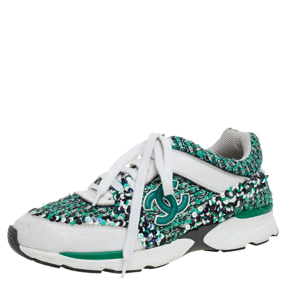 These green and white sneakers from Chanel are meant for sneaker lovers like you! They have been crafted from tweed and leather and adorned with sequins. They are designed with round toes, lace-ups on the vamps, and the iconic CC logo detailing on