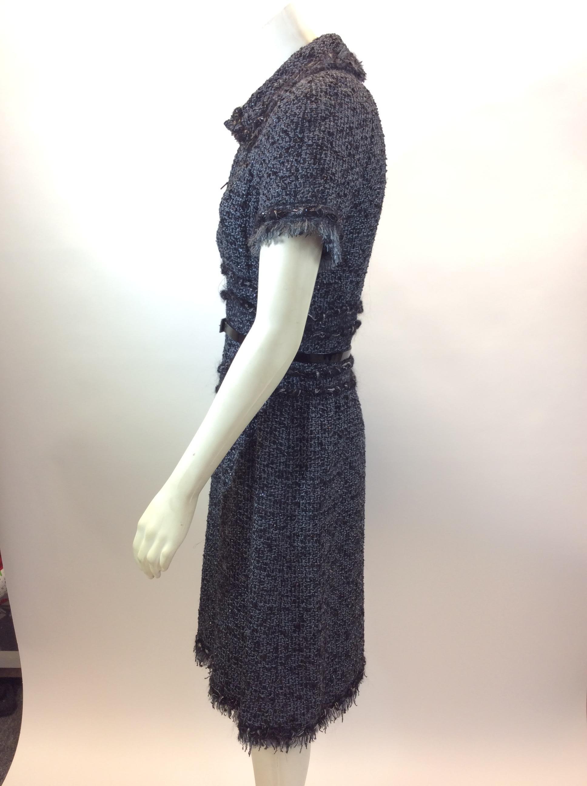 Chanel Grey and Black Tweed Belted Dress
$1999
Made in France
50% nylon, 27% polyester, 16% cotton, 7% wool
Size 38
Length 38