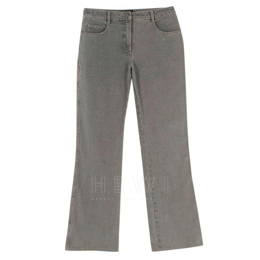Chanel grey bootcut jeans

grey washed colour
two back pockets
two front pockets
zip and button closure
bootcut fit
made in Italy

approx 
Measurements are taken laying flat, seam to seam. 

waist 37 cm
hips 47 cm
rise 25 cm
inside leg 76 cm
full