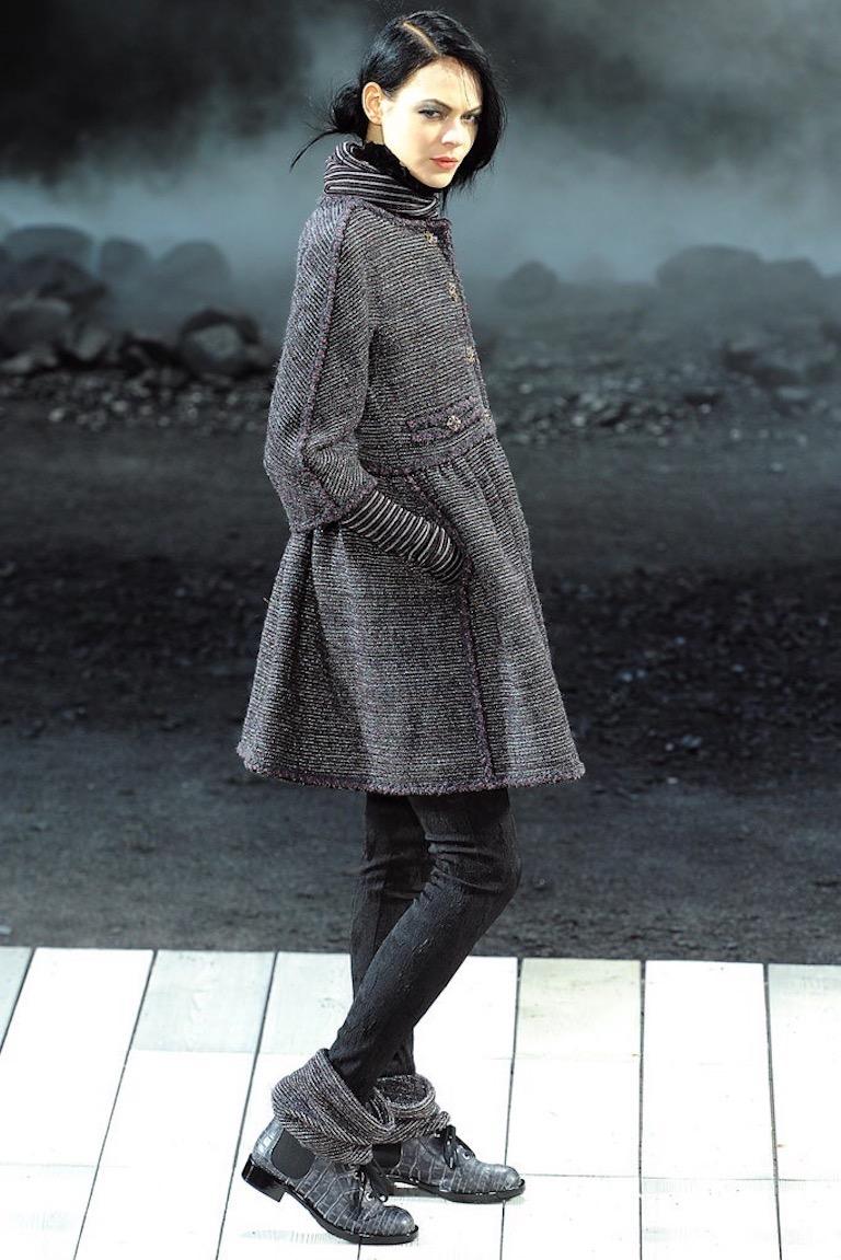Beautiful pre-owned, excellent condition for this  Runway piece from the Fall 2011 collection from the house of Chanel.

Collection: Fall 2011 Ready to Wear
Fabric: 62% wool - 22% nylon - 7% rayon - 3% polyester
Lining: 100% silk
Color: black, grey,