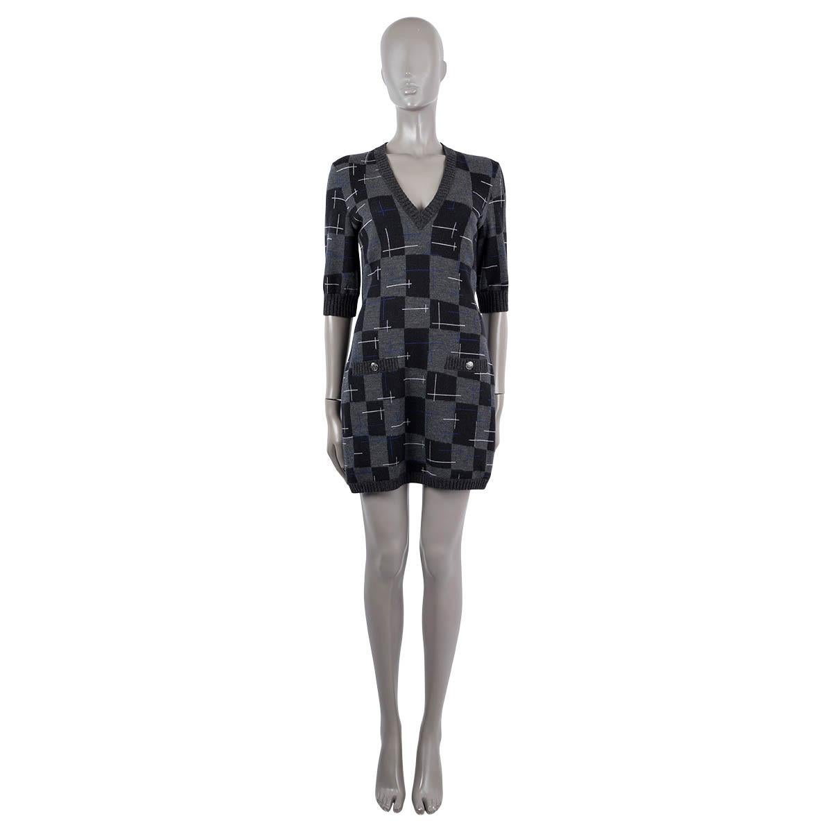 100% authentic Chanel mini check knit dress in grey, black, white, blue, red and pink cashmere (57%), wool (25%) and silk (18%). Features a V-neck, half sleeves, two buttoned logo pockets on the front and Coco Chanel writing on the back. Has been