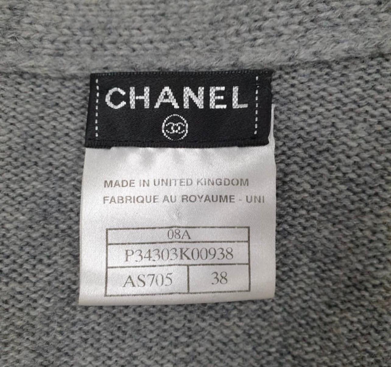 Gorgeous thick buttery soft grey pure cashmere cardi coat from CHANEL 
2008 Autumn collection. 
Pewter CC logo buttons. I
Lightly worn condition with only very minor pilling. 
Sz.38