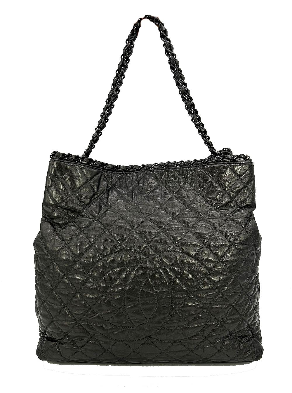 Chanel Grey Metallic Leather Chain Me Shoulder Bag Tote in excellent condition. Metallic ddark grey leather quilted in signature diamond pattern trimmed with dark gunmetal hardware and woven chain and leather shoulder strap and top edge. Quilted CC