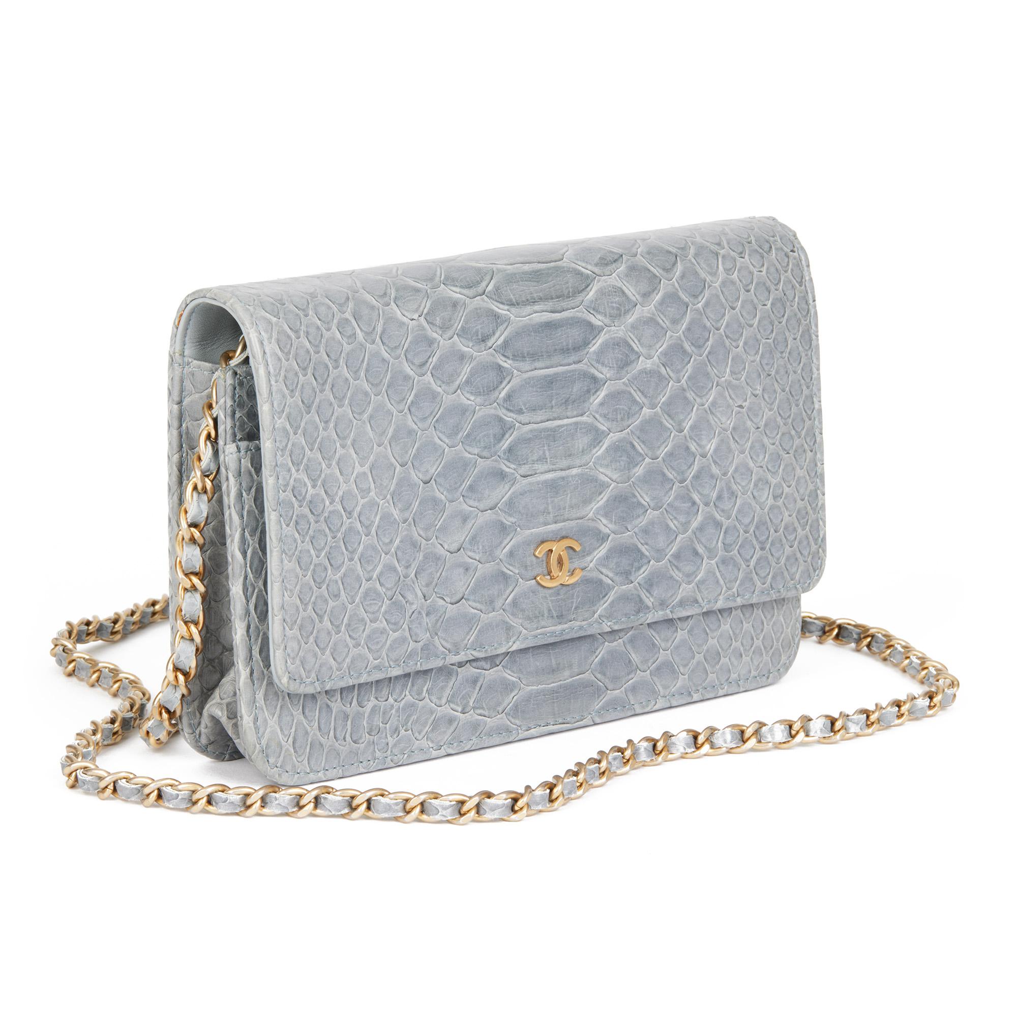 CHANEL
Grey Python Leather Wallet-on-Chain WOC

Serial Number: 18631709
Age (Circa): 2014
Accompanied By: Chanel Dust Bag, Authenticity Card
Authenticity Details: Authenticity Card, Serial Sticker (Made in France)
Gender: Ladies
Type: Shoulder,