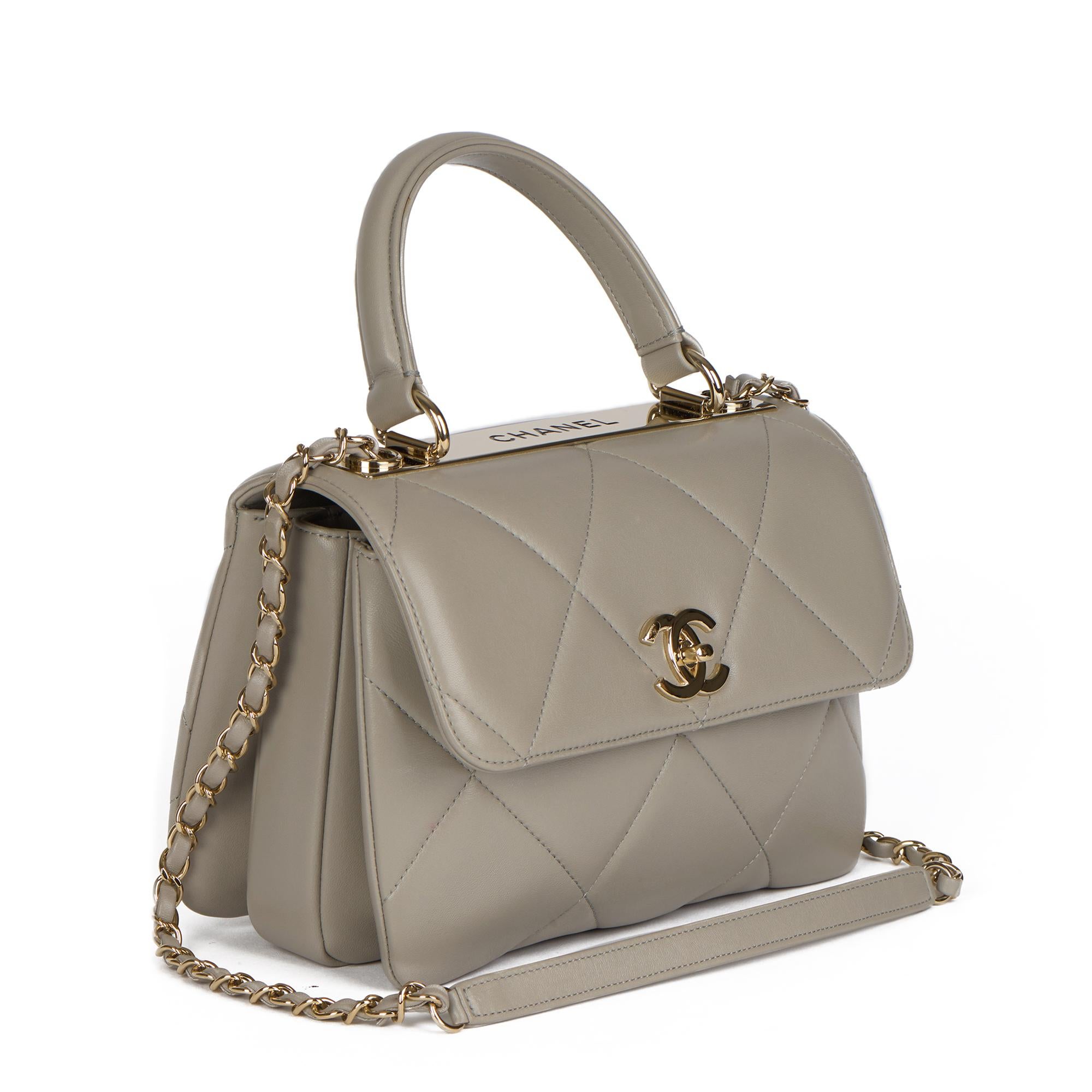 CHANEL
Grey Quilted Lambskin Leather Small Trendy CC Top Handle Flap Bag

Xupes Reference: HB4439
Serial Number: 28739138
Age (Circa): 2019
Accompanied By: Chanel Dust Bag, Box, Authenticity Card, Receipt, Invoice, Care Booklet
Authenticity Details: