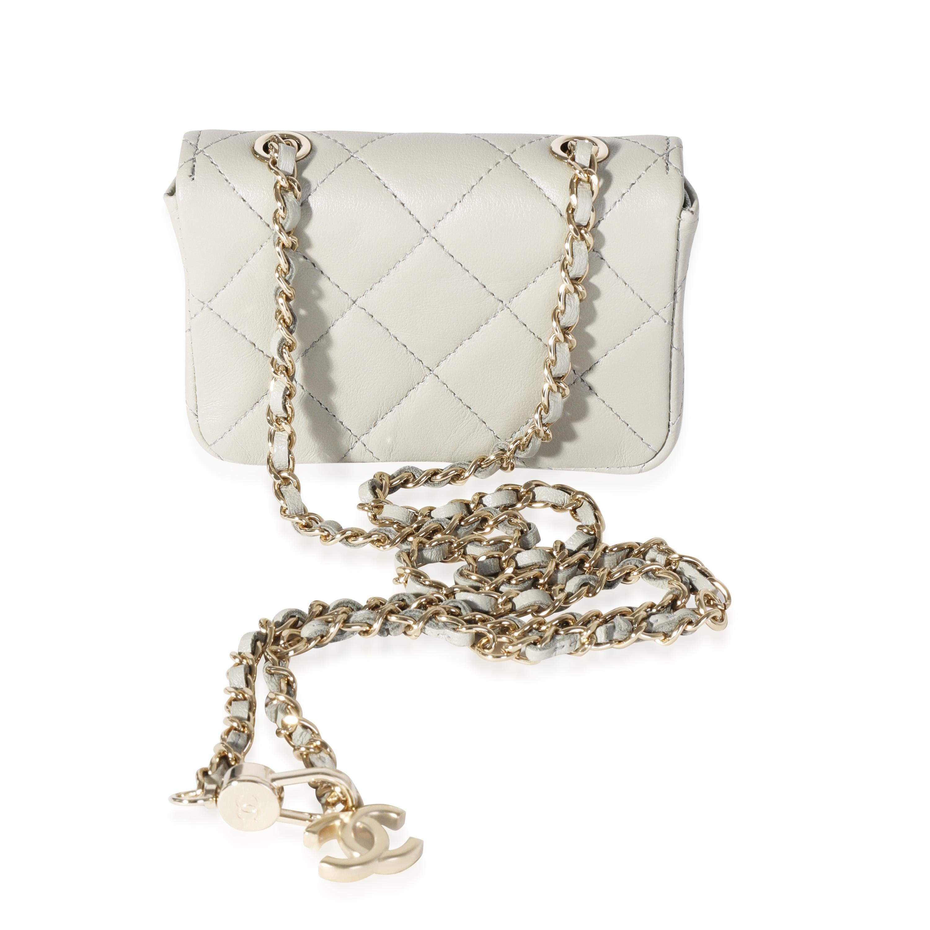 Listing Title: Chanel Grey Quilted Lambskin Mini Chain Belt Bag
SKU: 116652
Condition: Pre-owned (3000)
Handbag Condition: Never Worn
Brand: Chanel
Model: Grey Quilted Lambskin Chain Belt Bag
Origin Country: France
Handbag Silhouette: Belt