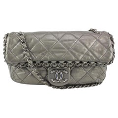 Chanel Graue gesteppte Ledertasche mit Kette und Klappe 1122c4