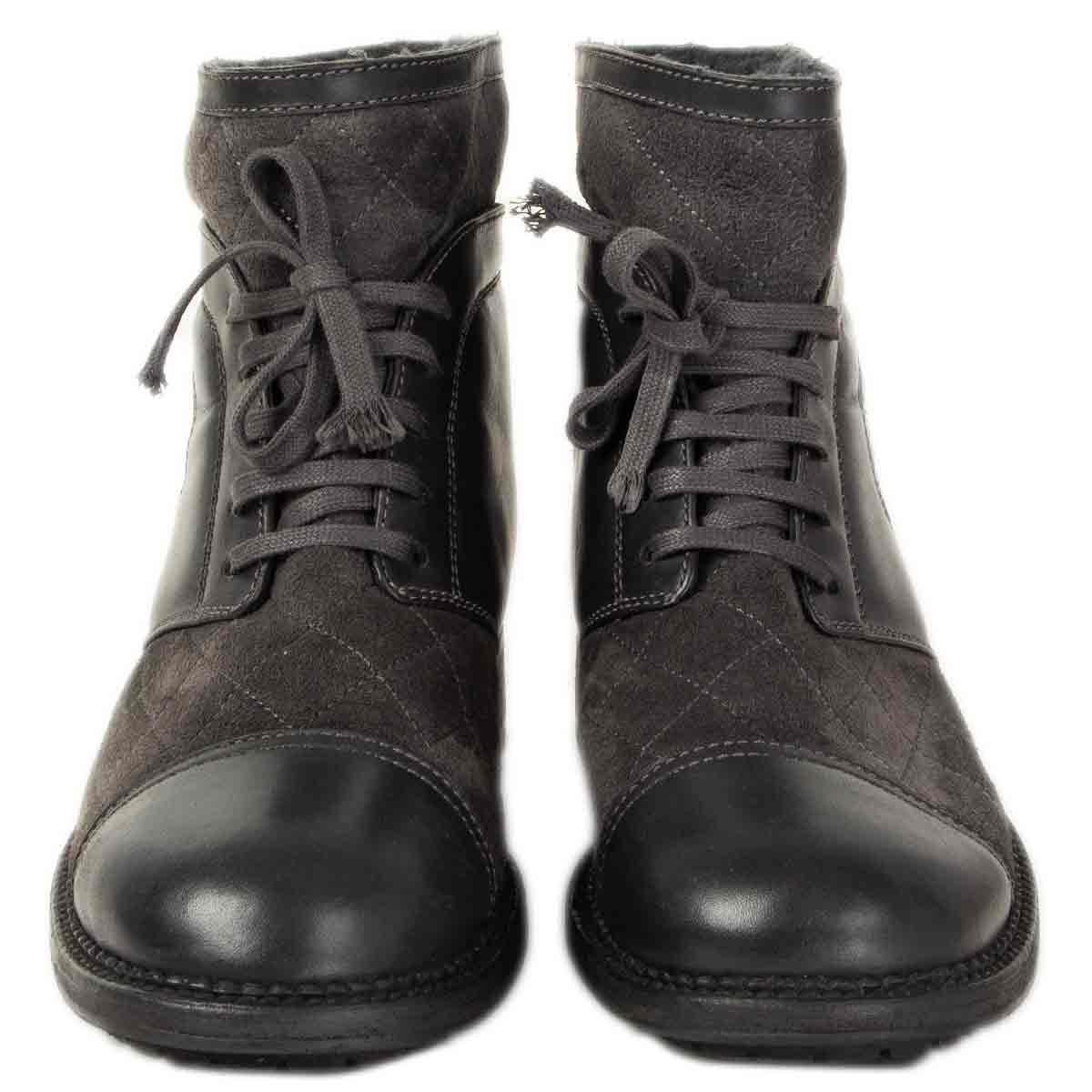 100% authentic Chanel quilted lace-up ankle-boots in grey suede and charcoal calfskin featuring CC logo stitching on the side and shearling lining. Have been worn and are in excellent condition. 

Measurements
Imprinted Size	38
Shoe Size	38
Inside