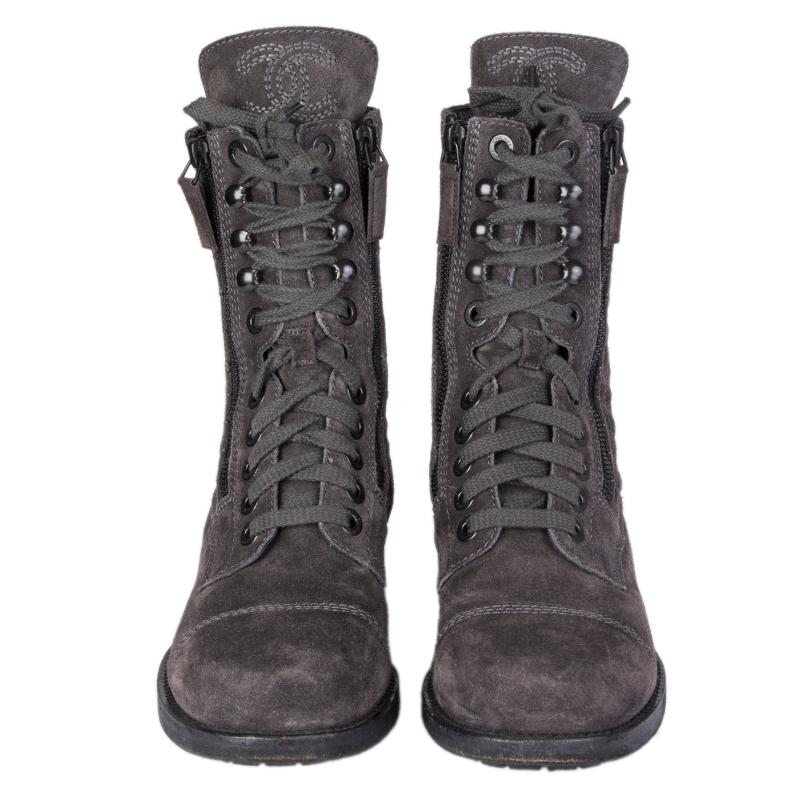 100% authentic Chanel lace-up quilted zipper boots in dark grey suede. CC logo stitching on the tongue. Have been worn and are in excellent condition. Come with dust bag.

Measurements
Imprinted Size	38.5
Shoe Size	38.5
Inside Sole	25cm
