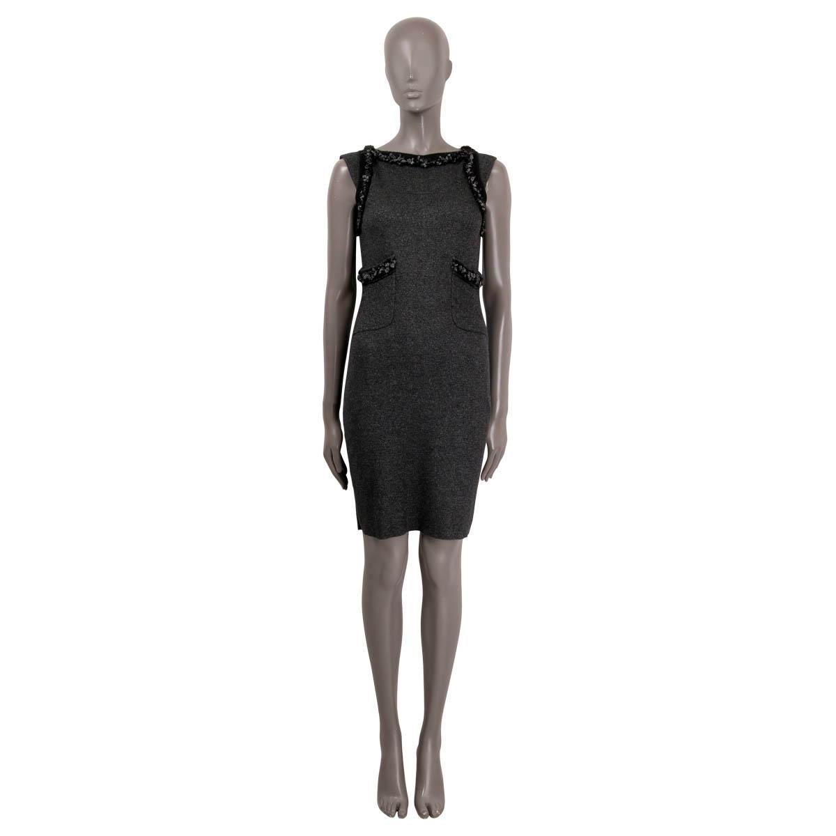 100% authentic Chanel sleeveless sheath dress in grey cashmere (73%), polyester (14%) and silk (13%) with silver lurex. Features a black and silver frill trim, CC button and two open pockets on the front. Has been worn and is in excellent