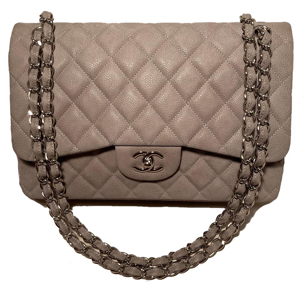 Chanel Grey Suede Caviar Jumbo Double Flap Classic 2.55 in mint condition. Elephant grey caviar leather with a brushed suede feel. Silver hardware trim and signature woven chain and leather shoulder strap which can be worn short (doubled) or long