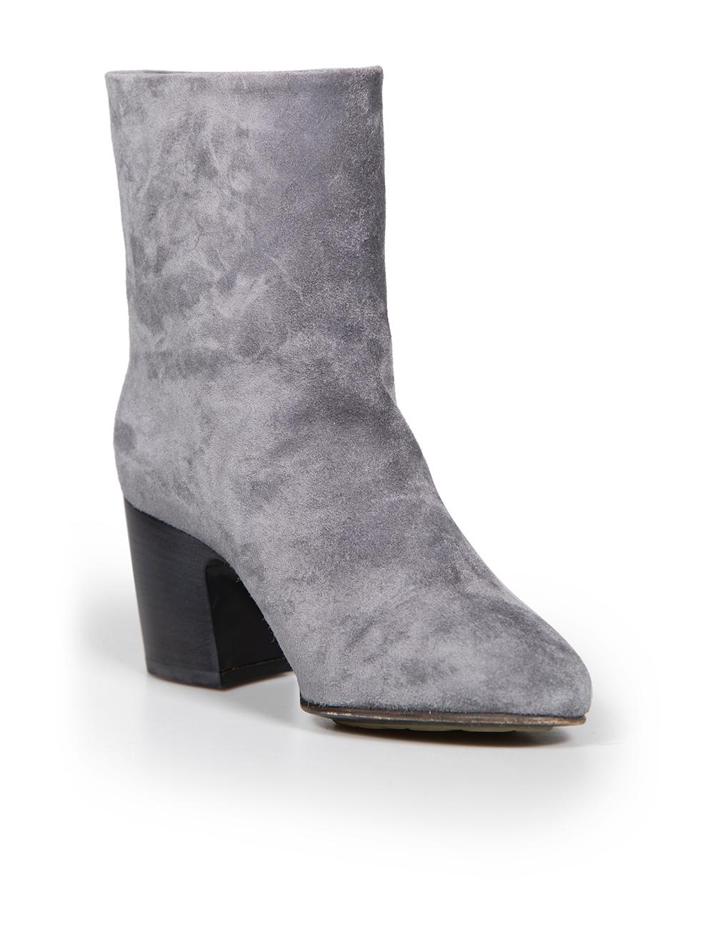 CONDITION is Very good. Minimal wear to boots is evident. Minimal wear to soles on this used Chanel designer resale item. These shoes come with original box and dust bag.
 
 
 
 Details
 
 
 Grey
 
 Suede
 
 Ankle boots
 
 Almond toe
 
 Mid block