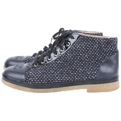 Chanel grey tweed and leather CC logo detail lace-up flat boots