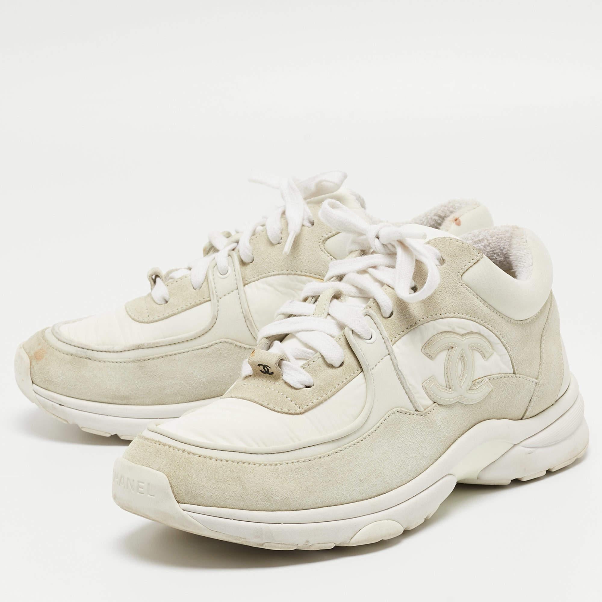 Elevate your footwear game with these Chanel CC sneakers. Combining high-end aesthetics and unmatched comfort, these sneakers are a symbol of modern luxury and impeccable taste.

