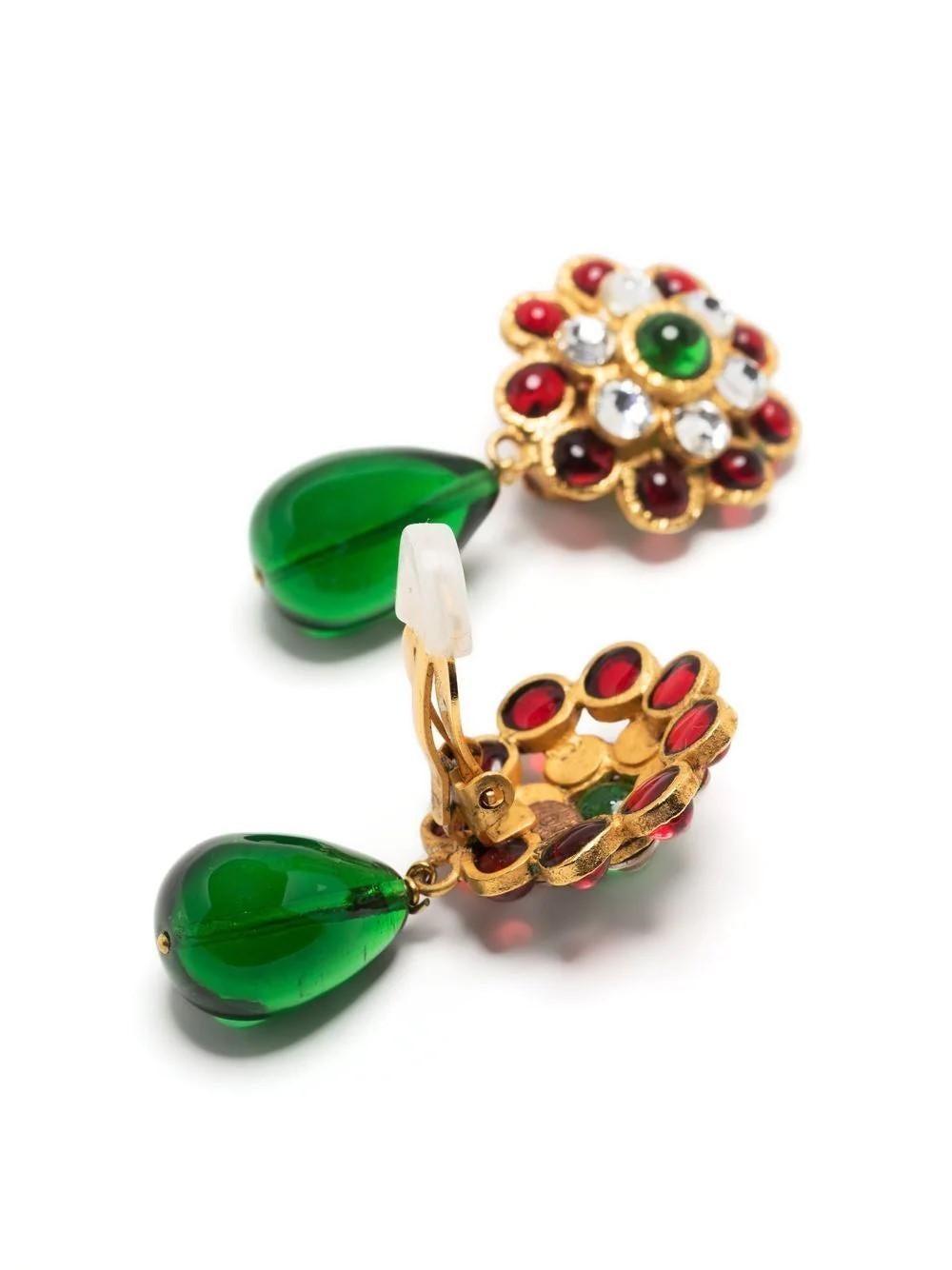 Working alongside Paris' famed jeweller specialising in glass beading, Gripoix Paris, Chanel presents these gold-plated drop earrings. Rich red and green-hued glass beads adorn the pair alongside crystal embellishments, with the pear-cut drop