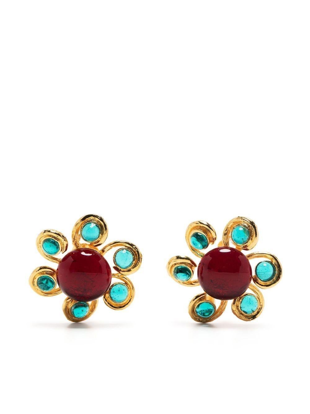 Working alongside Paris' famed jeweller specialising in glass beading, Gripoix Paris, Chanel presents these gold-plated clip-on earrings. Constructed in a delicate floral-shaped silhouette, the pair are adorned with aqua blue and red-toned glass