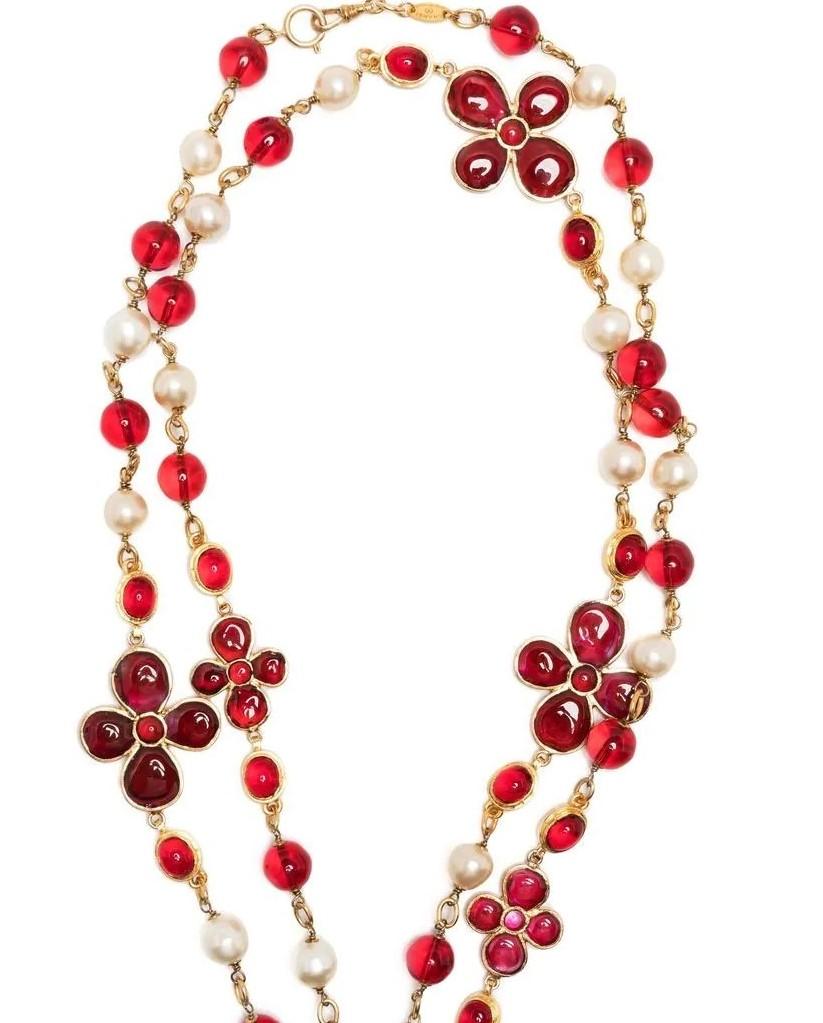 Working alongside Paris' famed jeweller specialising in glass beading, Gripoix Paris, Chanel presents this gold-plated layered necklace. Alternating with elegant faux-pearl detailing, red-hued glass beads add a vivid element to the timeless design.