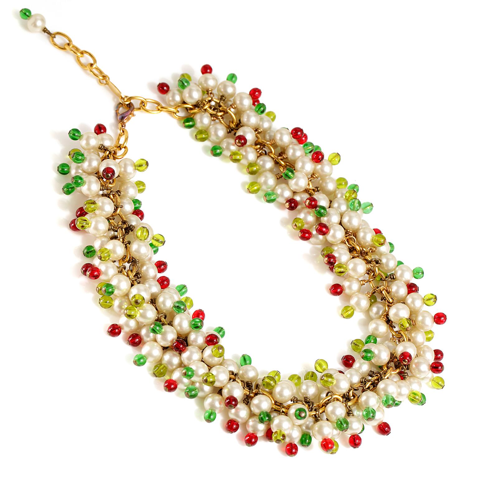 Chanel Gripoix Pearl Cluster Necklace- mint condition 
 From season 26 collection, 1980’s. 
Faux pearl grape clustered necklace with red and green beaded accents.  Gold tone chain with adjustable length lobster claw closure.  Made in France.

