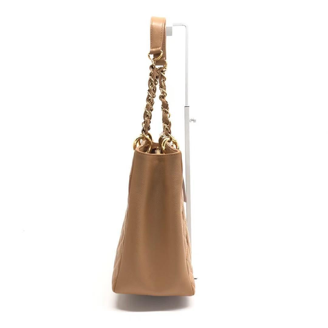 Chanel GST Grand Shopping Tote Camel Tan Caviar Leather PM, 2006-2008
 These are professional photos of the actual bag offered by Luxbags.
  
 Discontinued in 2015, the Grand Shopping tote bag is one CHANEL rarity that is highly treasured. This