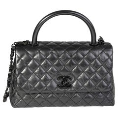 Chanel Gunmetal gesteppte Tasche aus gealtertem Kalbsleder Medium Coco mit Griff oben