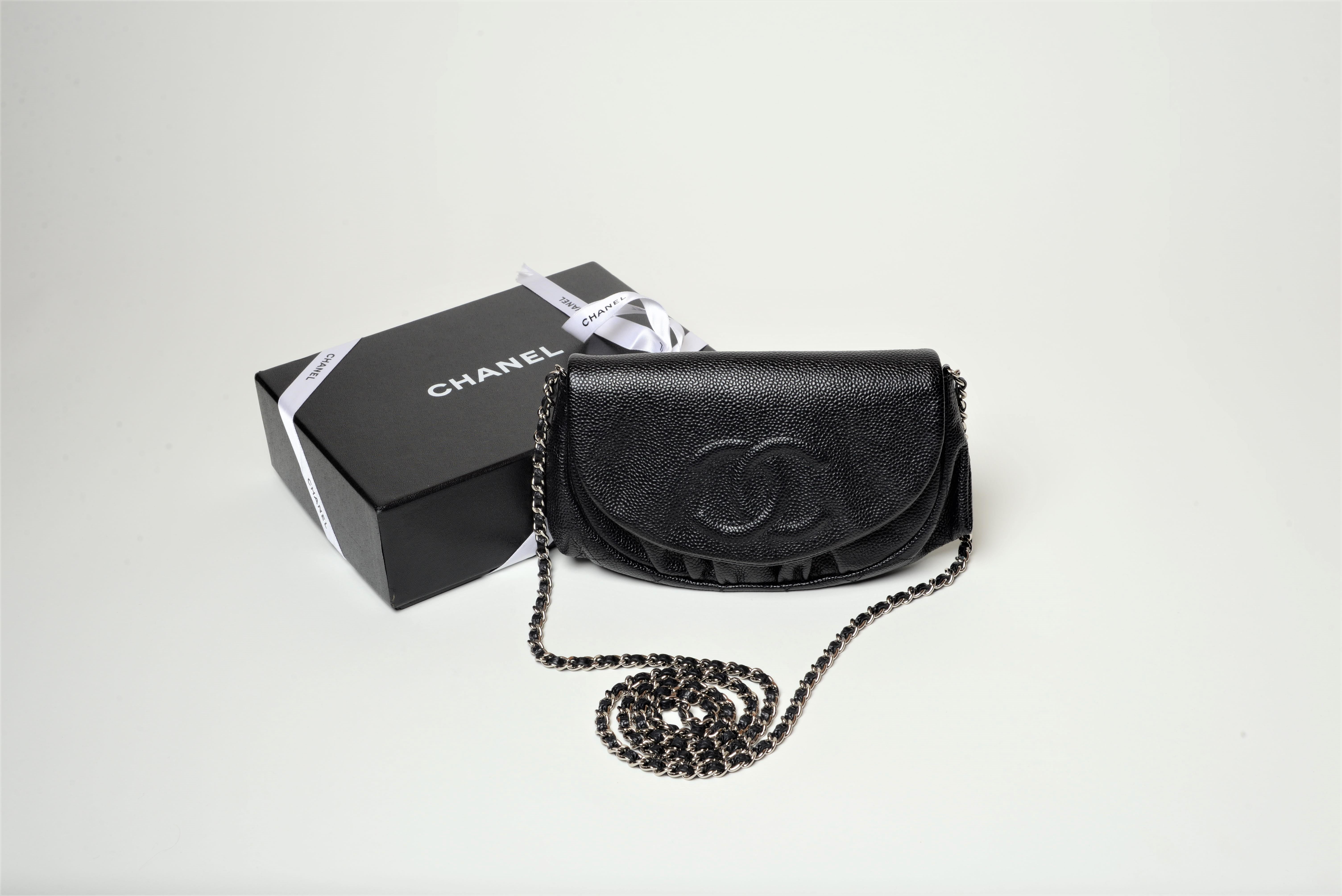 From the collection of Savineti we offer this Chanel Halfmoon WOC:
-	Brand: Chanel
-	Model: Halfmoon WOC
-	Year: 2011
-	Code: 15814567
-	Condition: Very Good
-	Materials: Cavier Leather 
-	Extras: Chanel Box & Dustbag

We at SAVINETI sell rare and