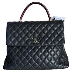 Chanel Coco Handle Maxi Black Caviar Leather Burgundy Lizard Handle Silver 32cm
