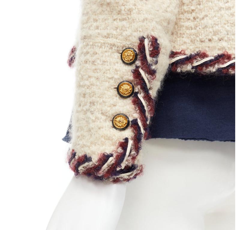 CHANEL Haute Couture ecru boucle tweed oval pocket nautical 2 piece jacket FR38
Reference: BMPA/A00159
Brand: Chanel
Designer: Karl Lagerfeld
Collection: 1980s
Material: Tweed
Color: Ecru
Pattern: Solid
Closure: Button
Lining:  Silk
Extra Details: