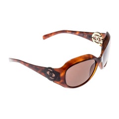 Chanel Brown Tortoise Sunglasses with Bow Detail For Sale at 1stDibs