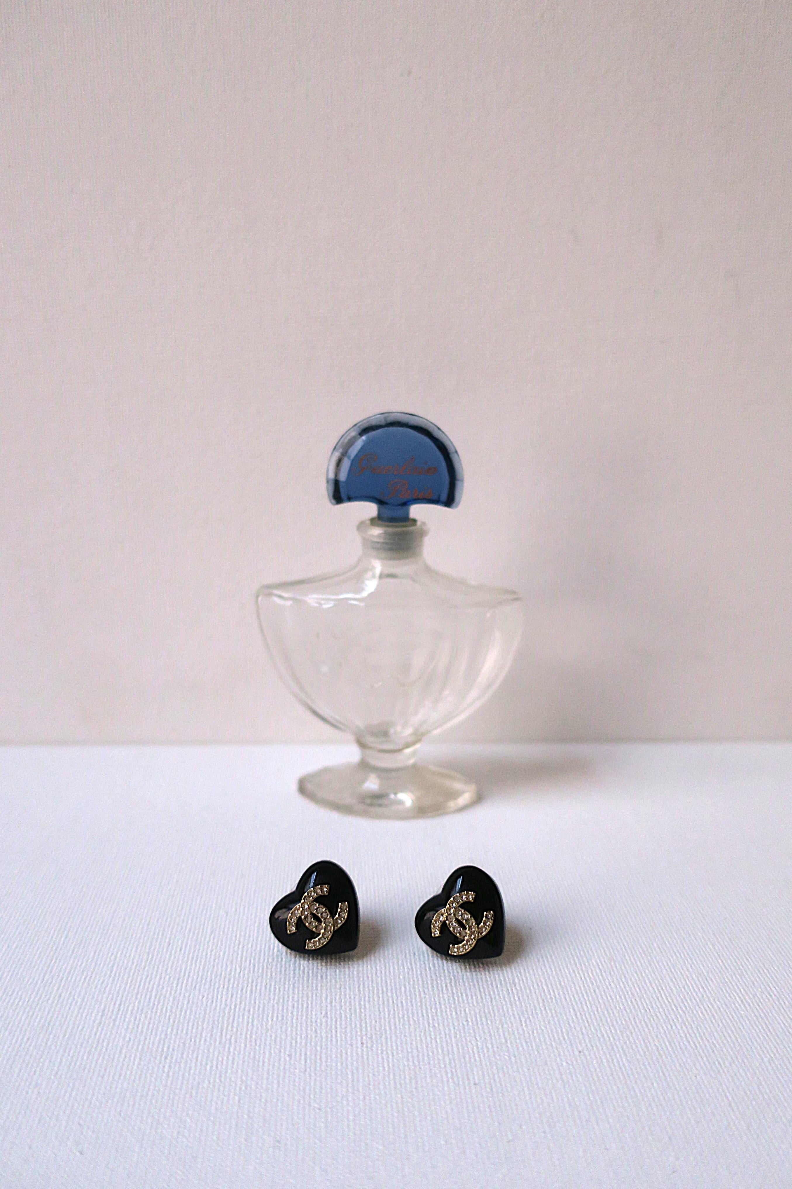 Femenino o masculino Pendientes Corazón Chanel, Pareja en venta