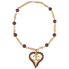Chanel 
Heart
 Long Golden Metal Necklace, 2008