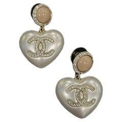 Chanel heart stud earrings