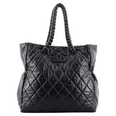 Chanel Tragetasche aus gestepptem Lammfell mit versteckter Kette